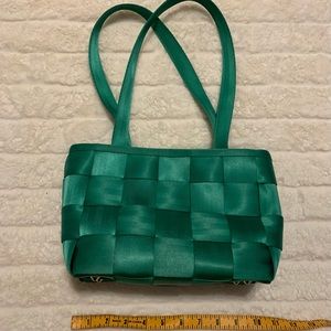 12x7 Emerald Green Seatbelt purse.Excellent condition.